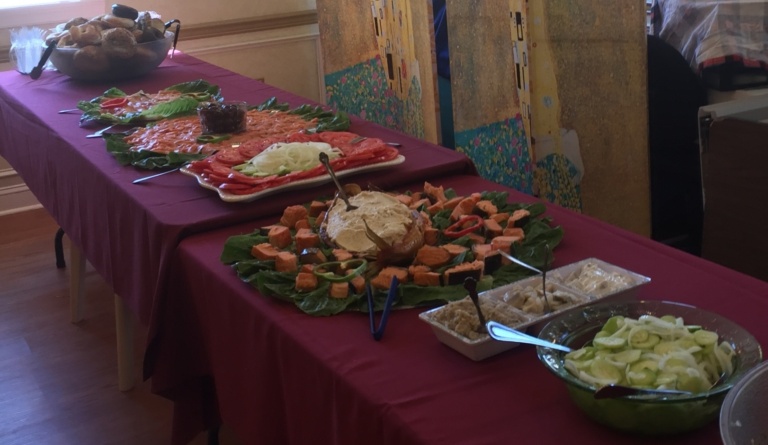 A spread of foods offered at our Shabbat kiddush luncheon